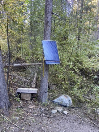 Off-site water trough using a solar panel, pump and battery to keep full.