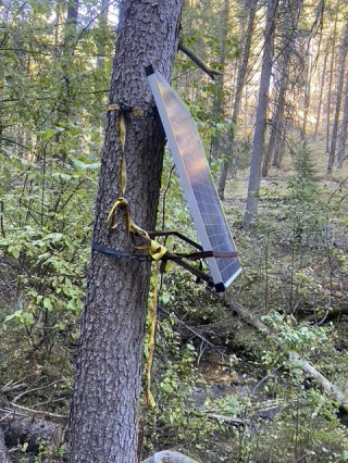 Off-site water trough using a solar panel, pump and battery to keep full.