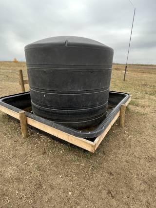 1,200-gallon tank fills via float from pipeline. Opens to 4 paddocks to allow access to cows and calves through grazing season.