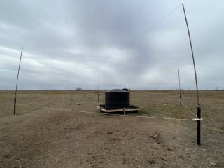Additional water trough filled via pipeline from three miles away. All floats inside the holding tank dissuade animals rubbing. Overhead electric fencing provides power to all sections.